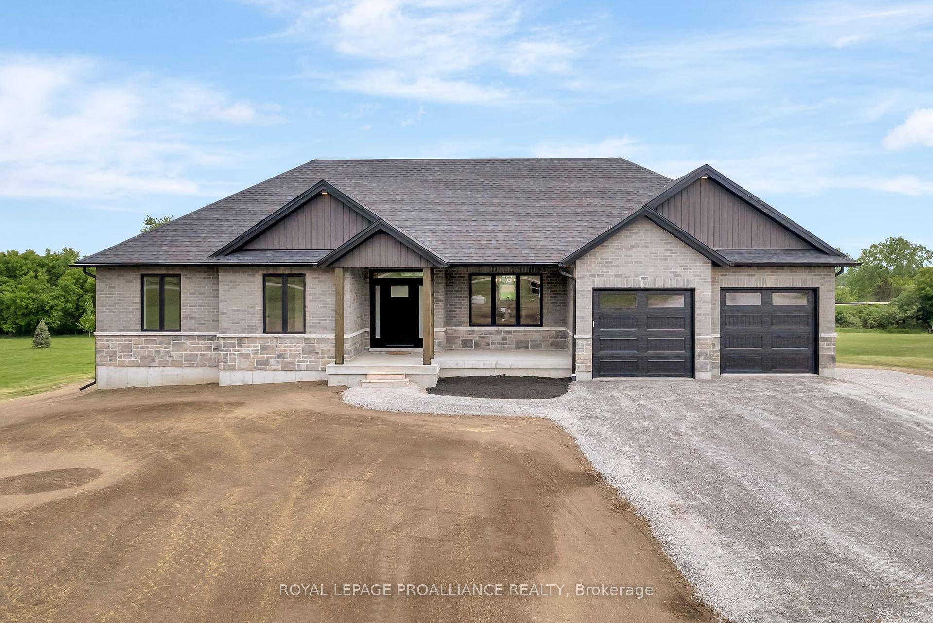 Brand new, 3 bed 2 bath home with flexible in law suite potential, conveniently located just outside the town of Brighton, on a lovely 1.