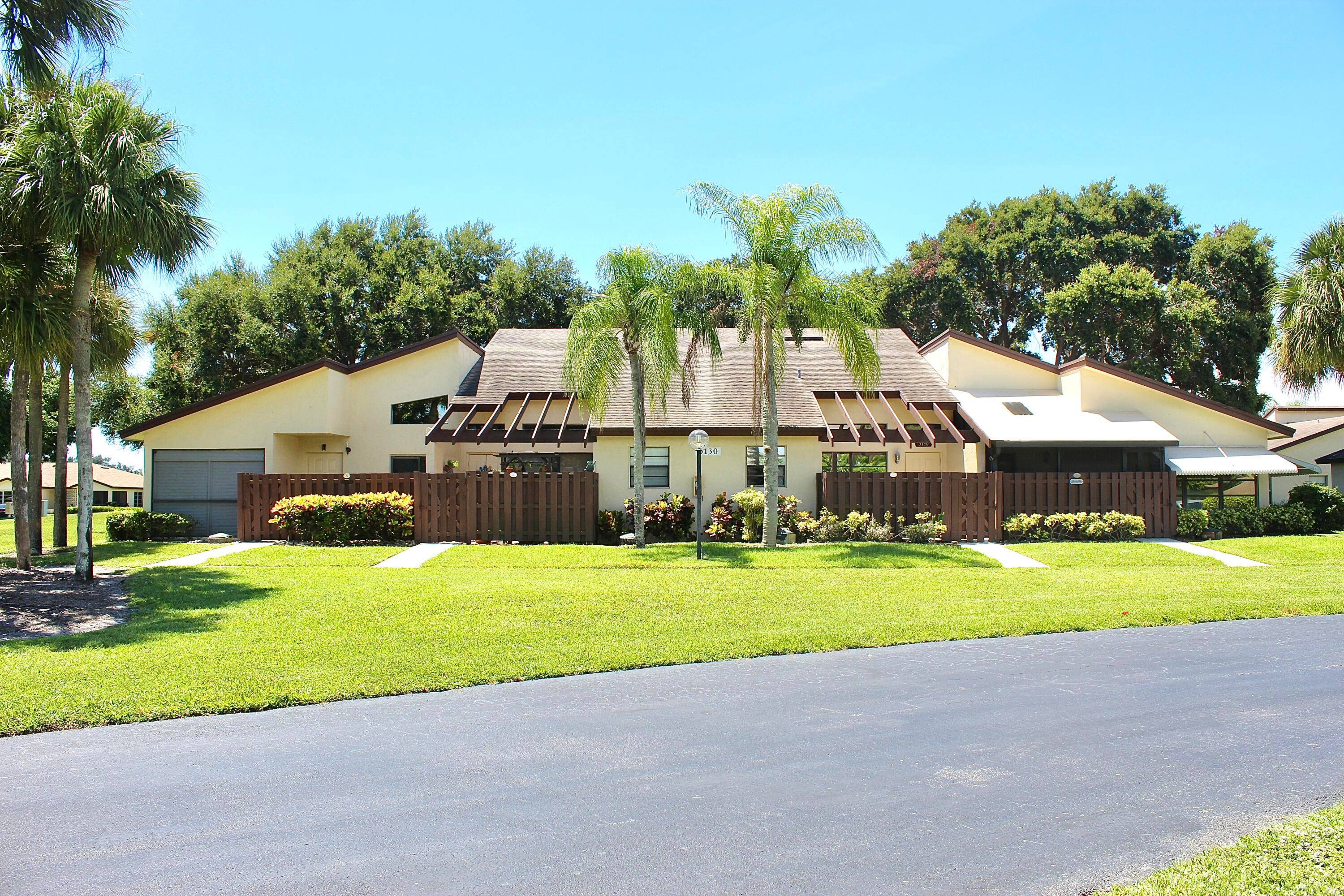 Spacious 2BR 2BA Villa with loft in a vibrant 55 community full of potential !