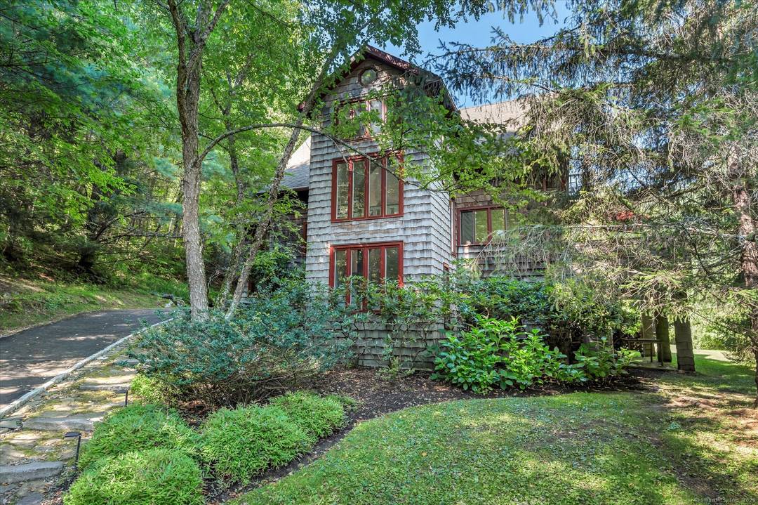 Nestled out of sight with complete privacy is this West Cornwall home with a traditional wood exterior but with a light filled modern interior !