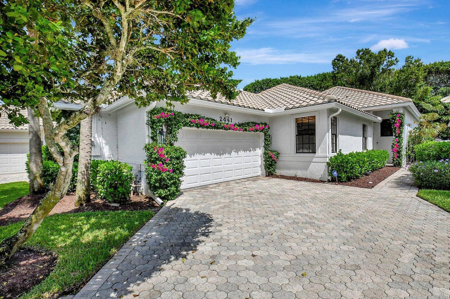 This seasonal rental includes a Club Course Golf Membership 6 month minimum rental Pink Bougainvillea flowers on garage and front of the house have been virtually enhanced.