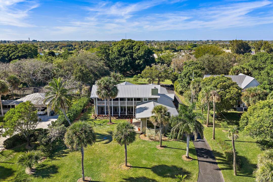 Discover the serenity of waterfront living in this private residential retreat, where breathtaking views of the scenic Indian River are enjoyed from nearly every room.