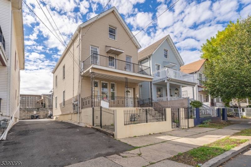 Welcome to this fully renovated two family home, perfect for owner occupants or investors.