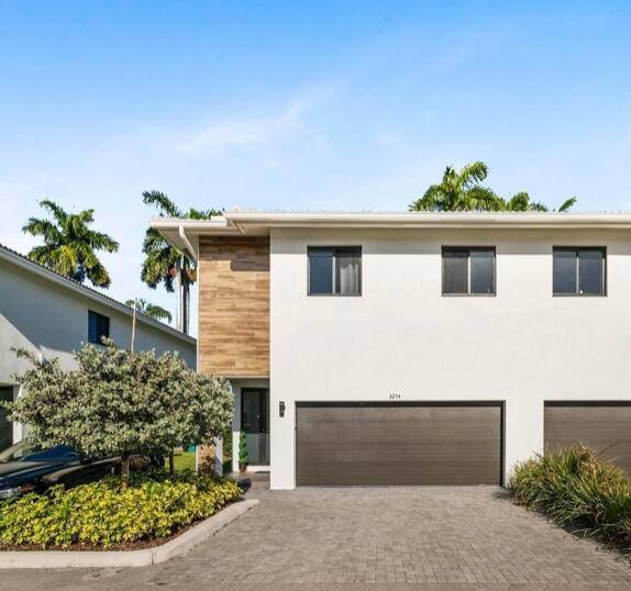 This modern home, built in 2019, is part of a new construction development with only 15 units in the neighborhood, offering 4 bedrooms and 2.