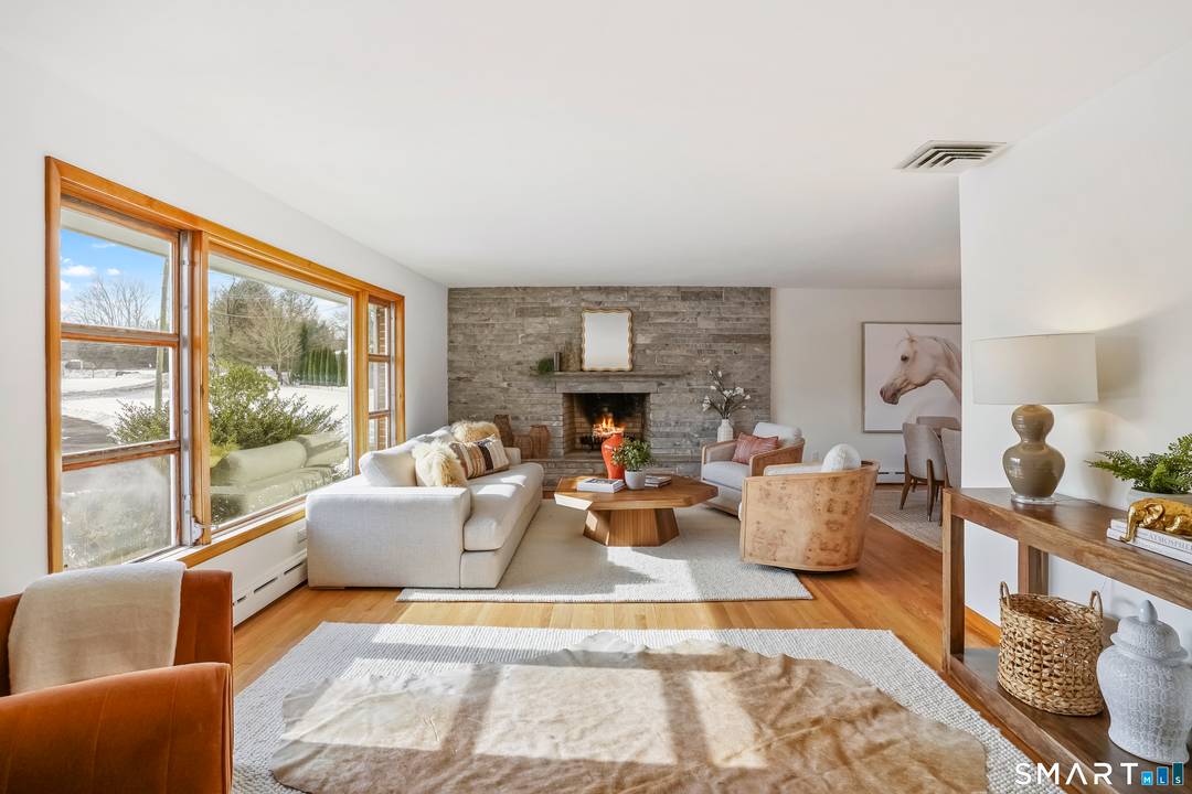 Tucked away on a quiet cul de sac on over an acre in the highly desirable Hunt Club neighborhood of Westport, this exceptional ranch style home offers a rare opportunity ...