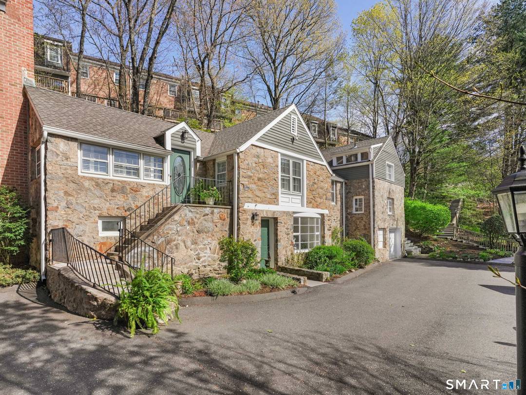 This original 1930 residence lives like a private SF home while offering the ease of a condominium association.