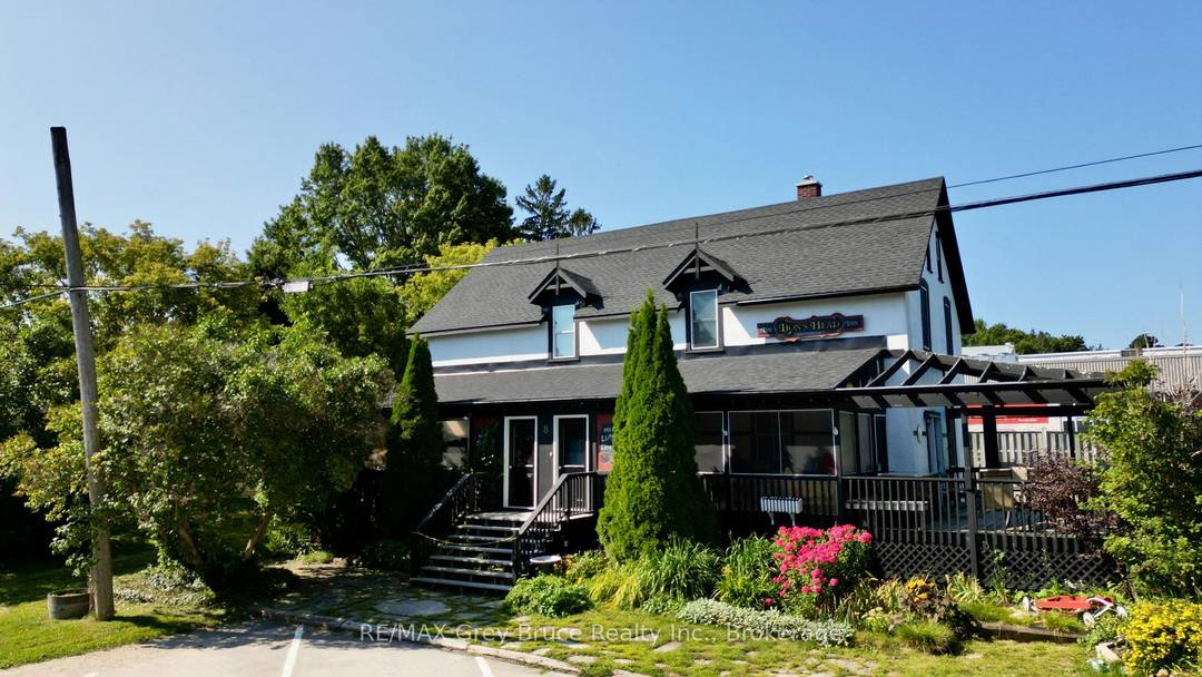 Location is Prime ! Here in the heart of Lion's Head, just a stroll to all amenities, including the sandy beach just across the street, this country inn has some ...