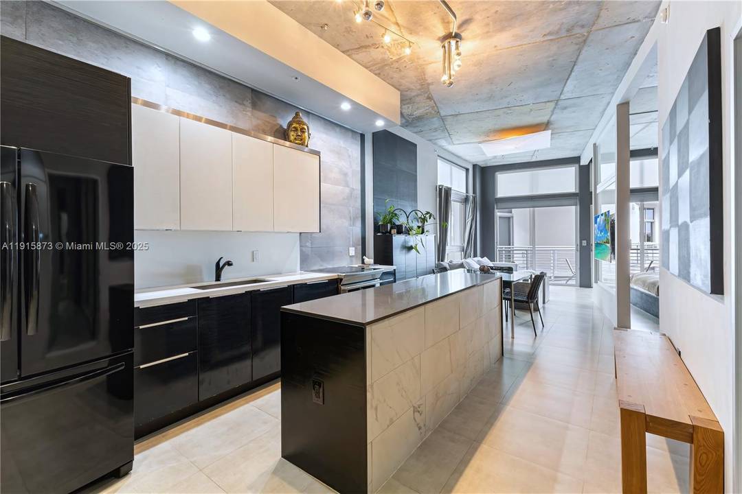 Oversized 1 bedroom loft style condo 802 SF at The Meridian, located directly on the Miami Beach Golf Course, steps to Sunset Harbour, beaches, and restaurants.