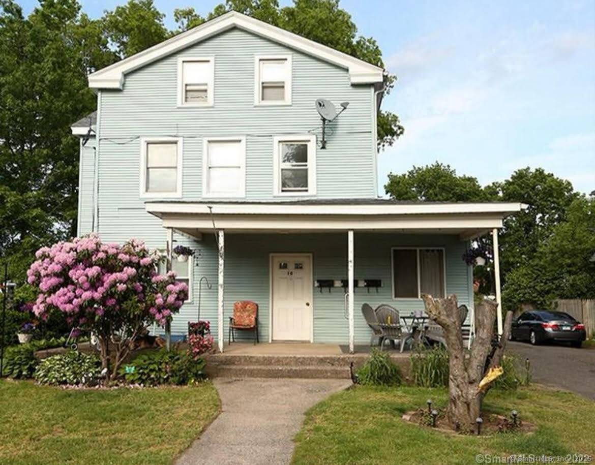 Traditional Legal three family home located in sought after location with level yard to enjoy outdoor activates.