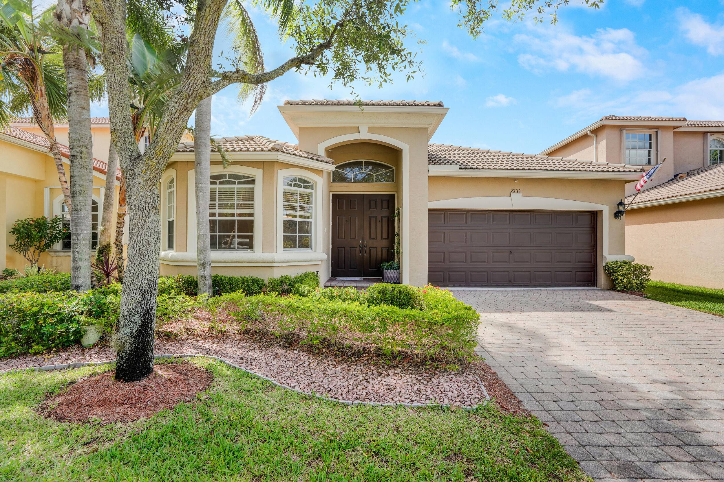 This light and bright 4 bedroom plus 3 full baths offers open space with a split bedroom floorplan.