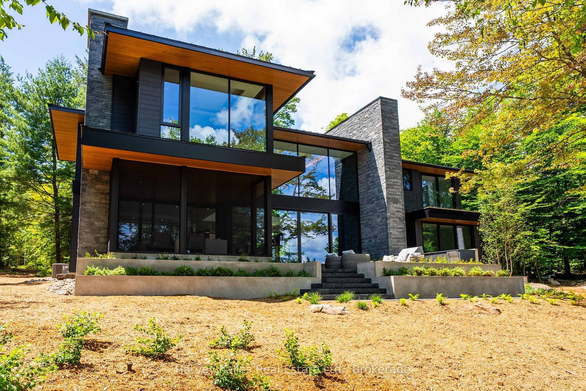 A stunning union of natural beauty and architectural excellence on the prestigious and coveted Innisfree shores of Acton Island.