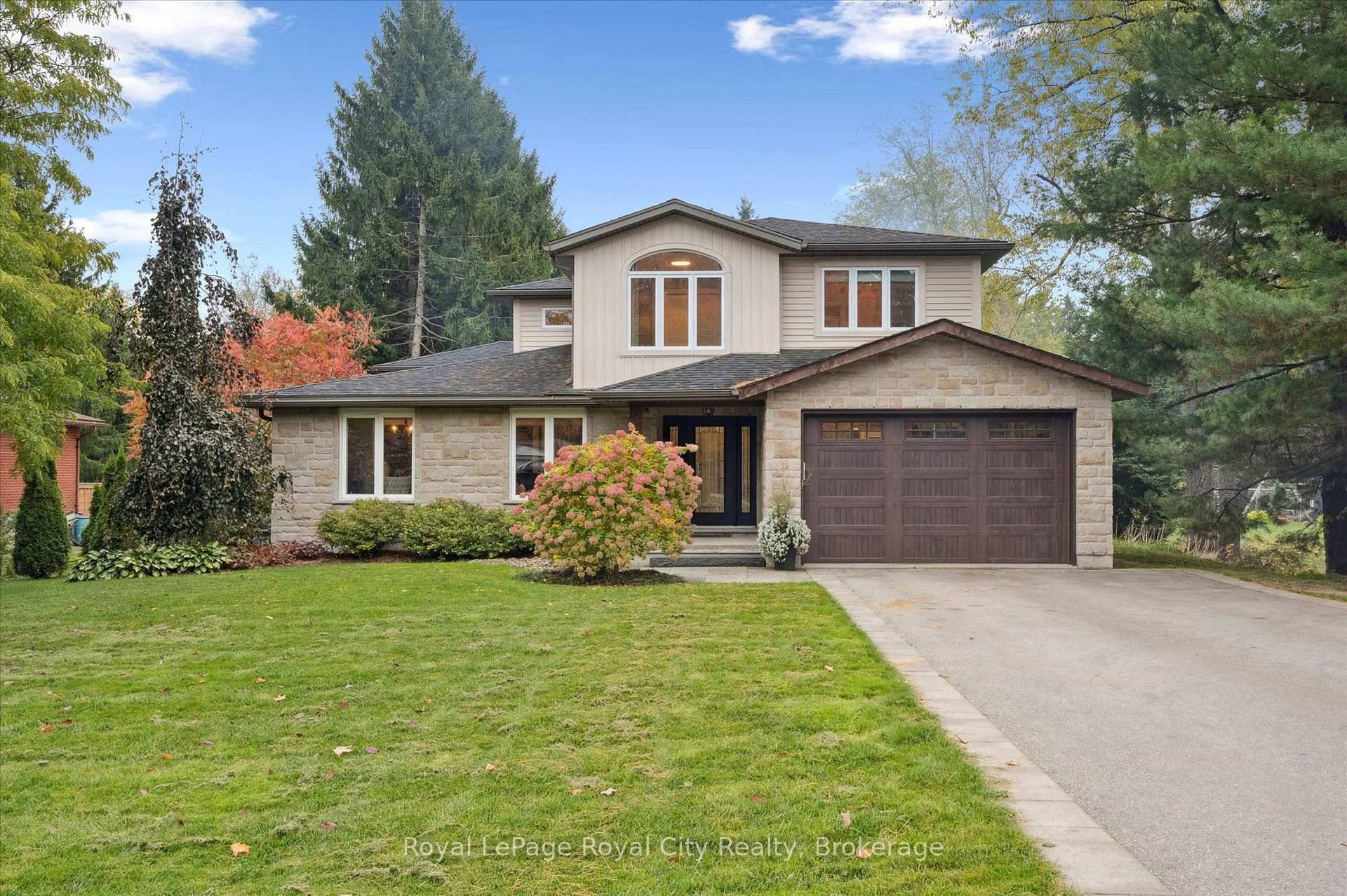 Tucked away on over an acre of peaceful, tree lined property, this thoughtfully renovated multi level home offers a rare blend of space, style, and soul.
