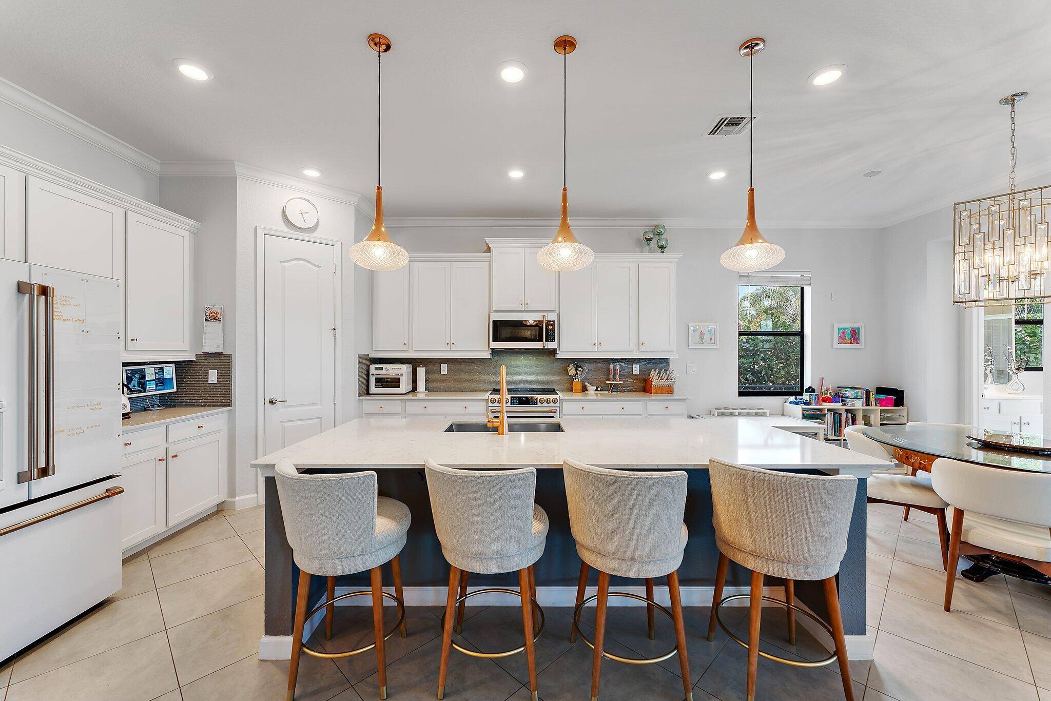 Welcome to the pinnacle of luxury living at 3134 Streng Lane, located in the exclusive Bellasera community in Royal Palm Beach.