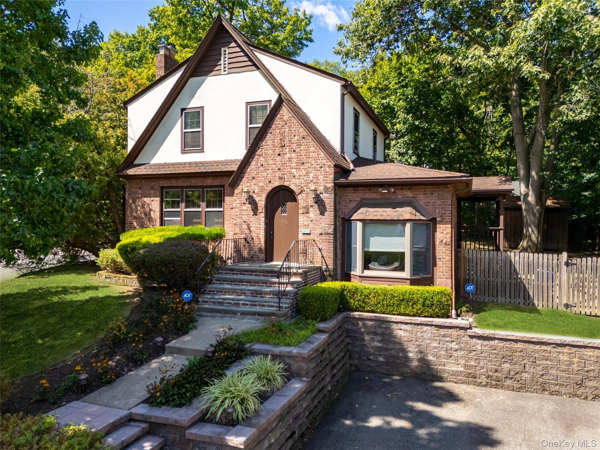 Welcome to this charming, updated Tudor style home in South Nyack, offering timeless character and modern comfort in a move in ready package.