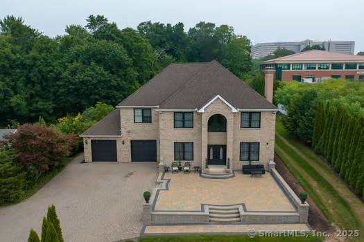 Elegant Brick Colonial 5 Beds 4 Full Baths 4, 032 SF Built in 2006 and nestled on a serene 2 acre level lot, this meticulously maintained brick Colonial offers exceptional ...