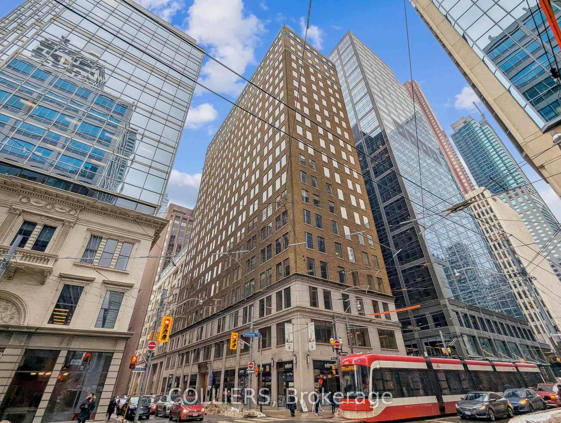 Turnkey full floor office with exposed ceiling and high end finishes.
