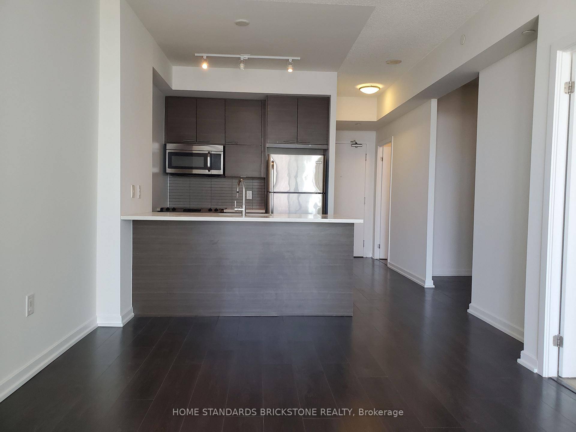 Bright and spacious 1 Den with Unobstructed South View !
