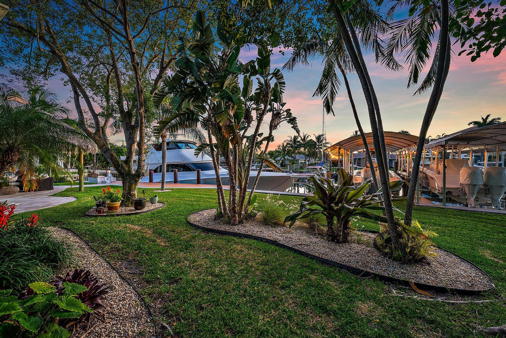A boater's paradise over 100 feet of deep water frontage with no fixed bridges and direct ocean access.