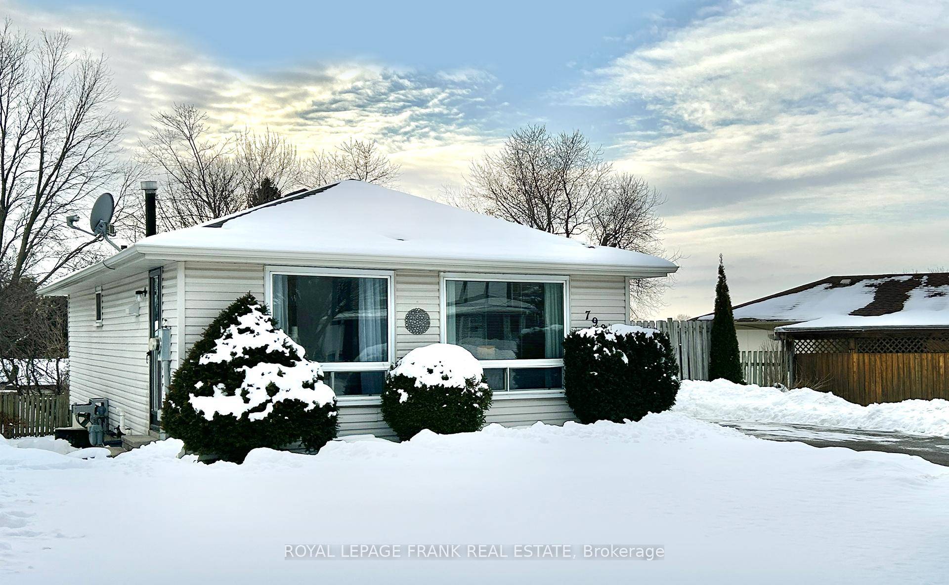 This beautiful, well maintained true bungalow is nestled on a quiet street with lots of mature trees.