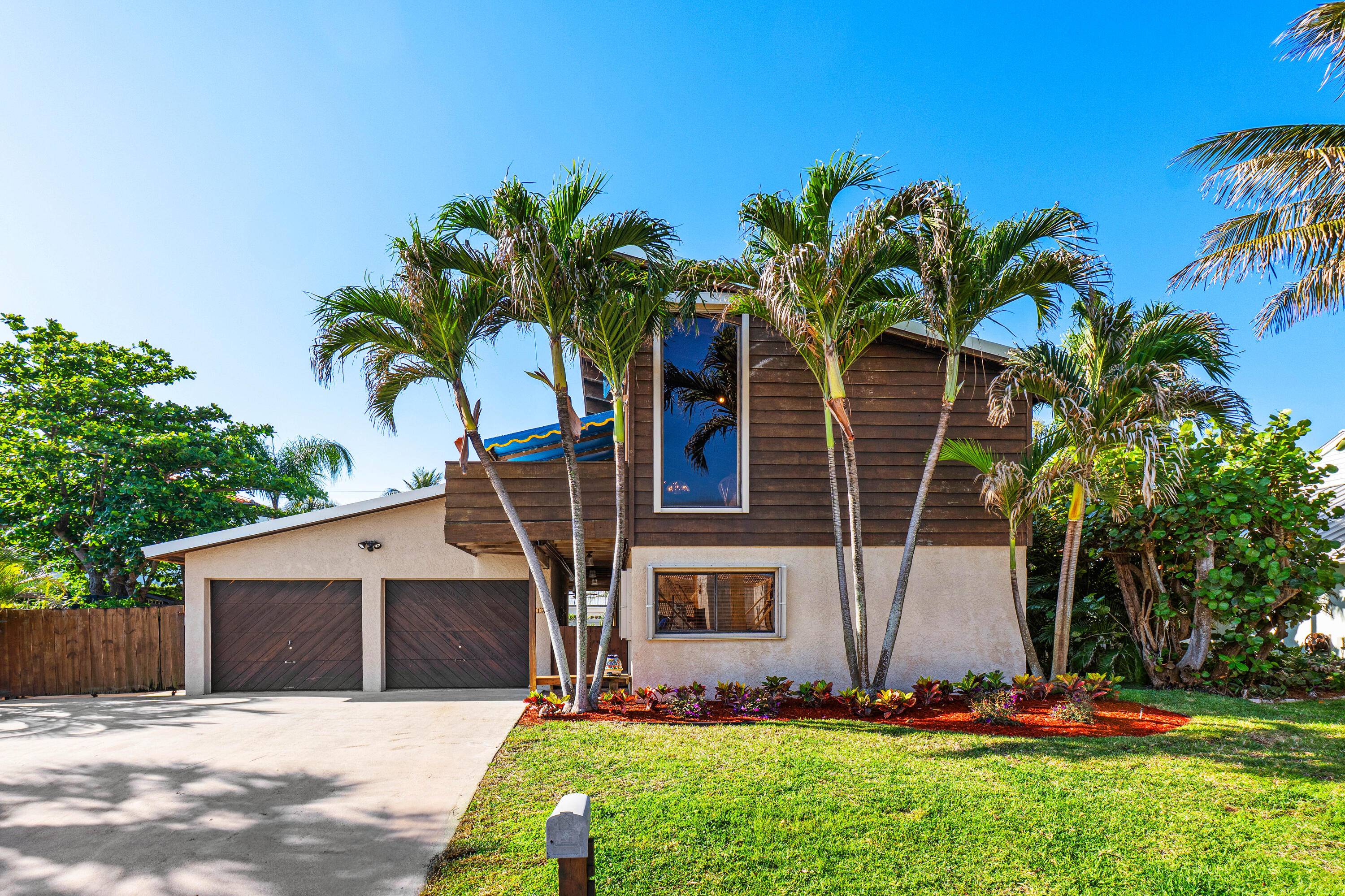 This nostalgic island side home is not just a residence it is a sanctuary that seamlessly integrates comfort and style with a prime location situated on a private street.