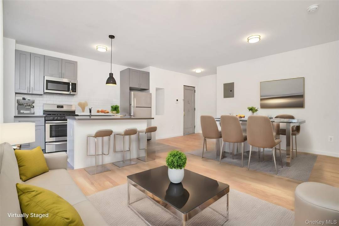 Welcome to 1069 Grant. This stunning four unit townhouse perfectly blends timeless charm with modern upgrades, making it an exceptional investment opportunity.