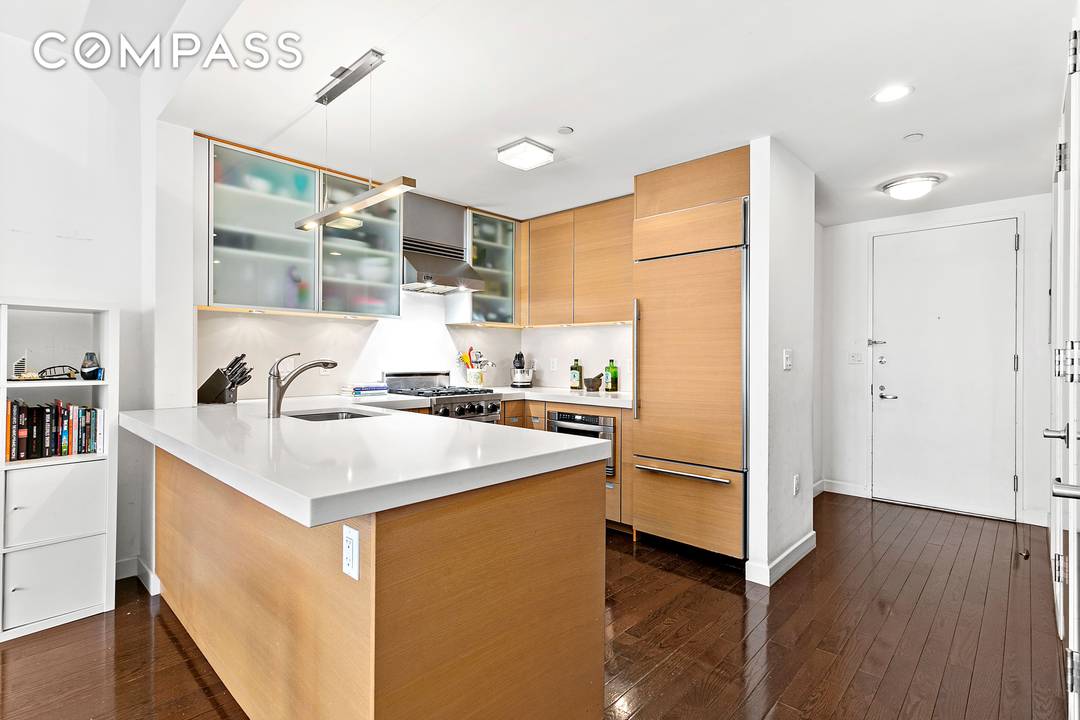 Residence 3E at Hudson Hill Condominium is a rare and expansive 995 square foot one bedroom home that lives far beyond its footprint, offering two full bathrooms and a versatile ...