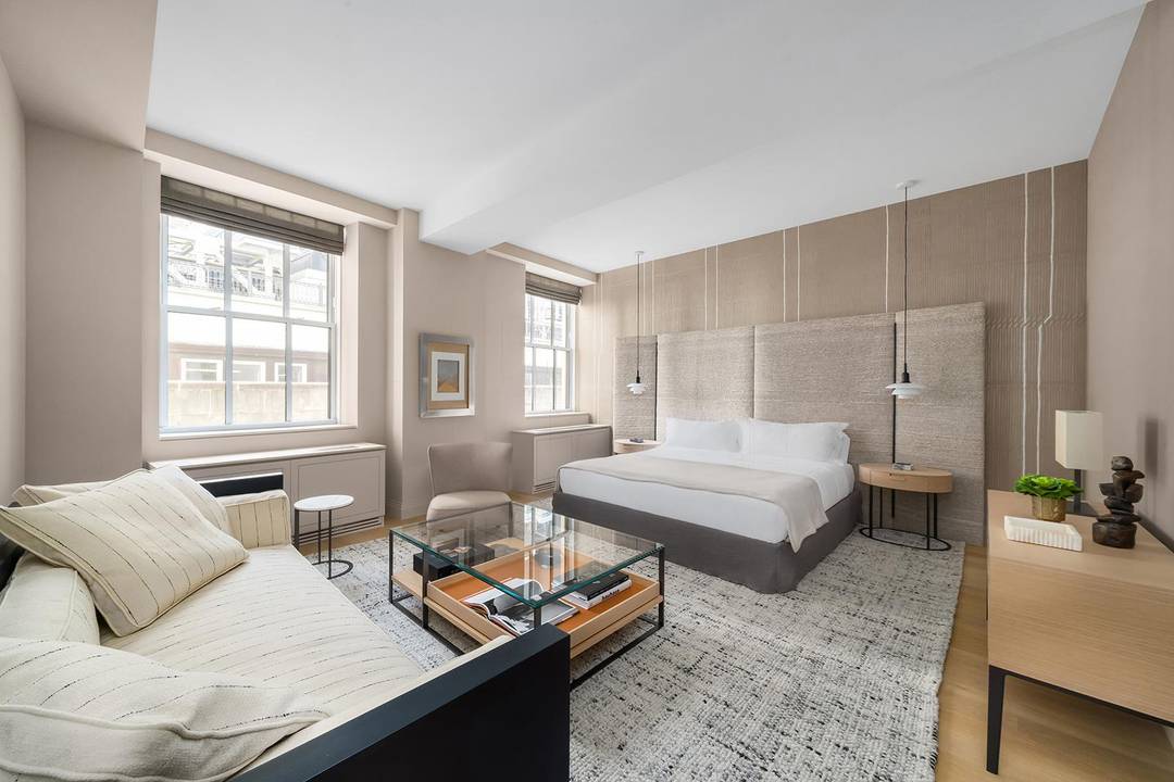 Move In Ready ! Residence 926 is an alcove studio with home office at One Wall Street.
