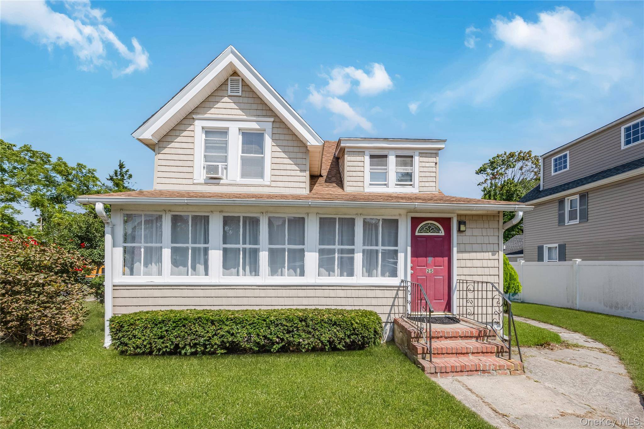 Welcome to This Beautifully Updated 2 Family Home Located in the Charming Community of Islip.
