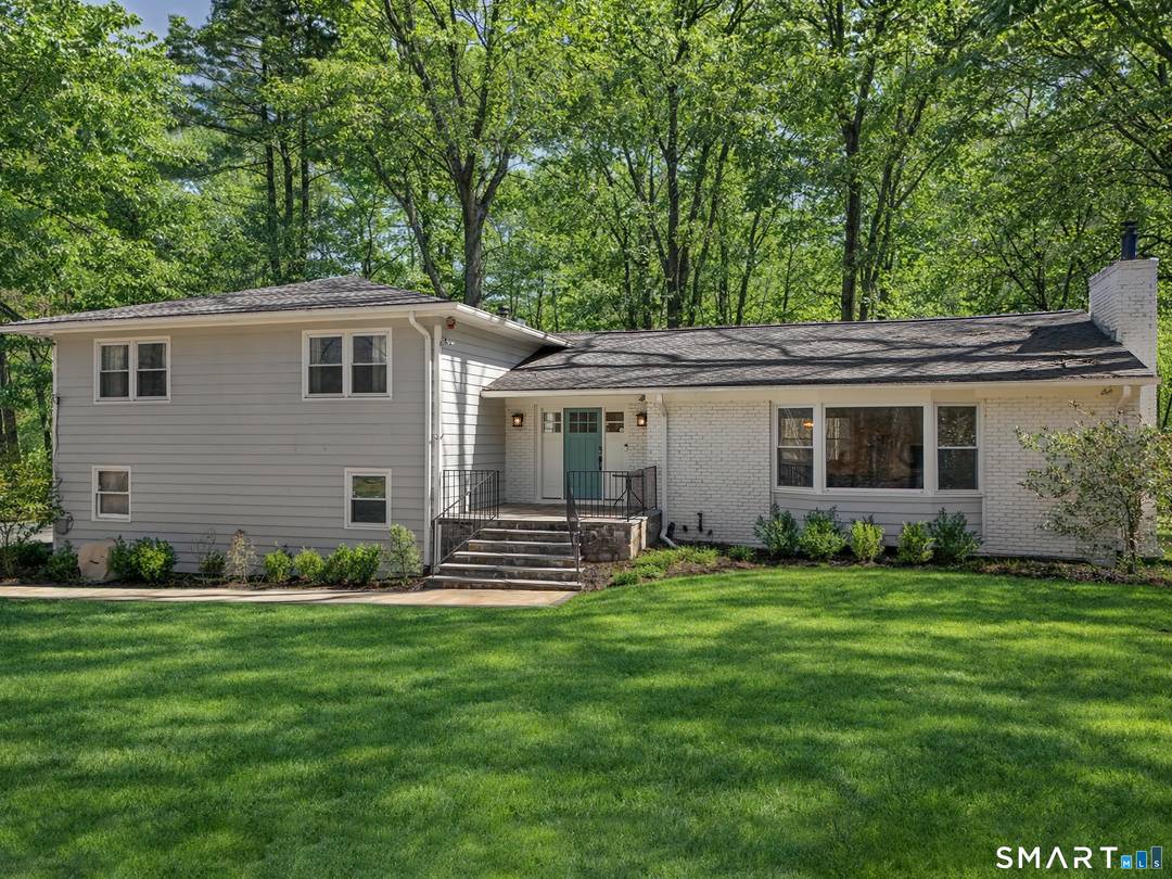 Set on a beautiful private property with sweeping lake views, this turnkey 4 bedroom, 3 bath home lives like a true 5 bedroom with additional lower level living space not ...