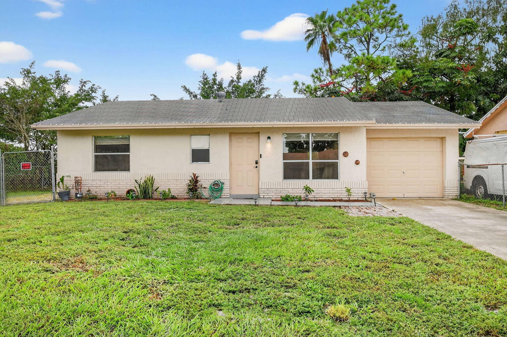 Charming 3 bedroom 2 bathroom corner lot single family home.