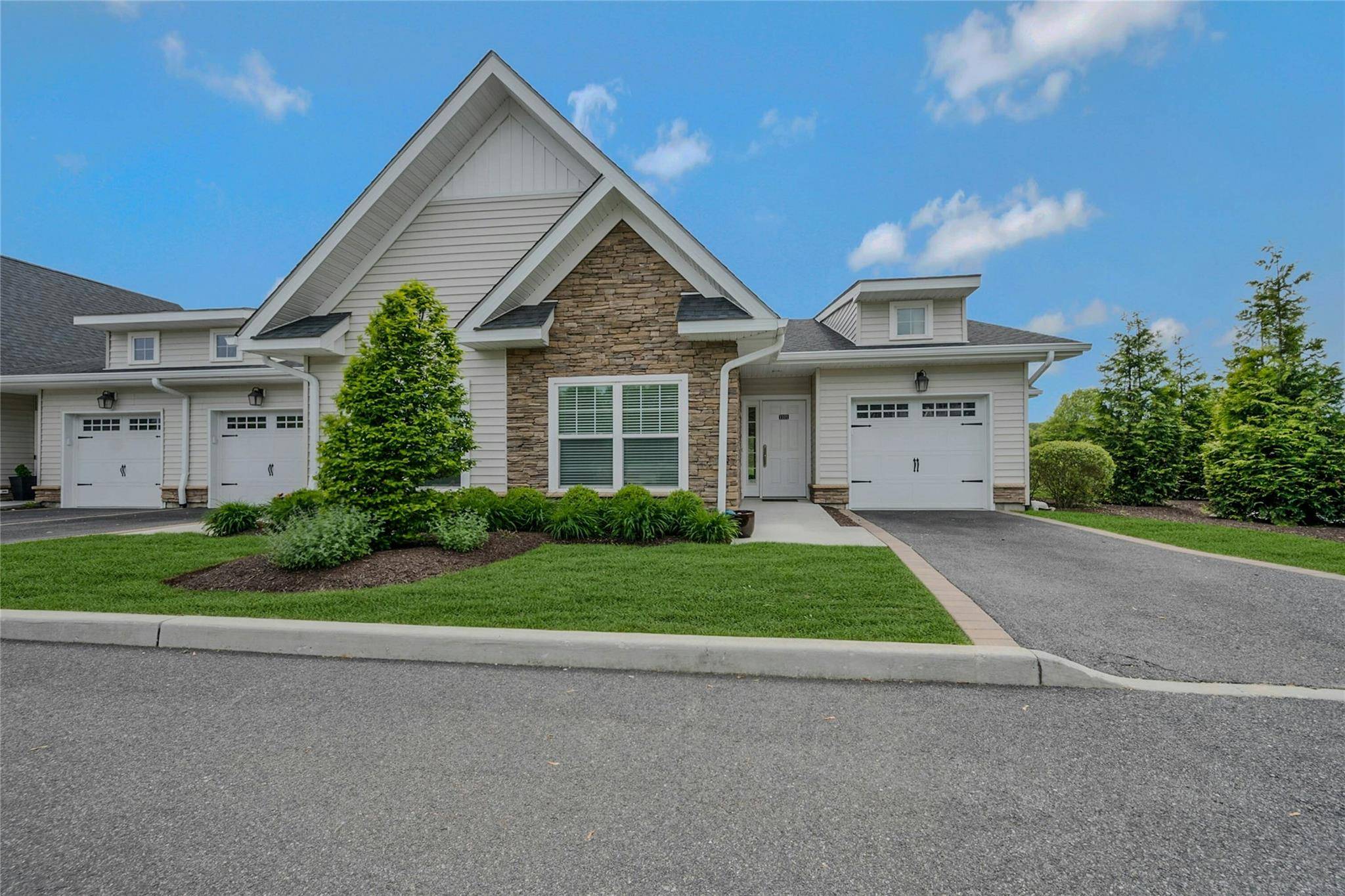 Welcome to 1101 Fox Hill, One of a kind corner villa located in Baiting Hollow Vista's.