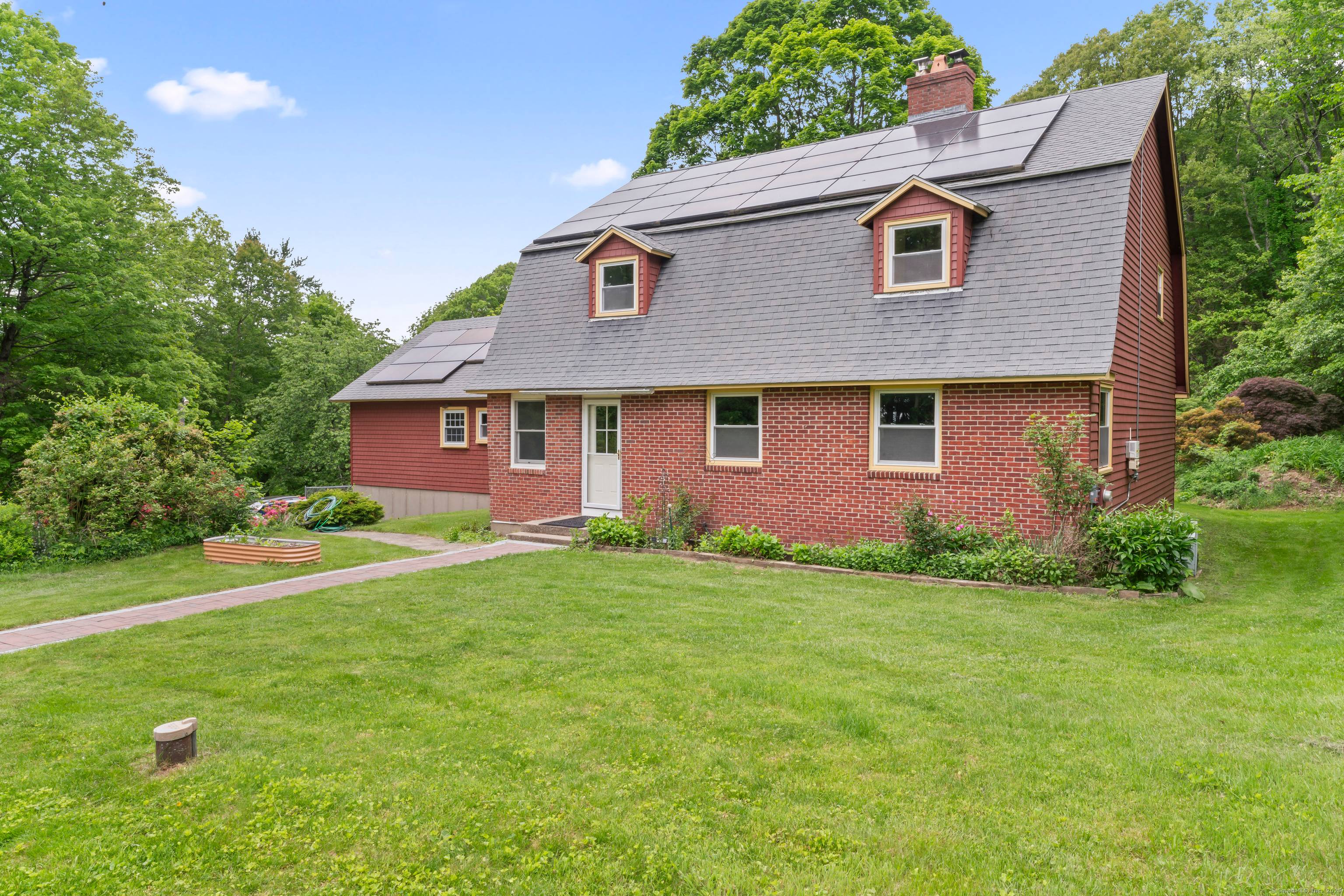 Welcome to your private retreat in Oxford, CT, where 5 peaceful acres of nature, gardens, and quiet surround you.