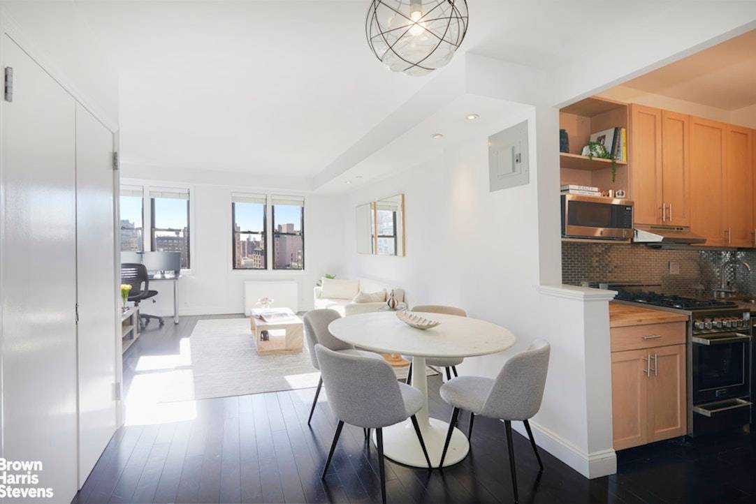 LOW MAINTENANCE ! Step into this beautifully renovated, high floor convertible one bedroom, where abundant natural light and open city views create an inviting, contemporary feel.