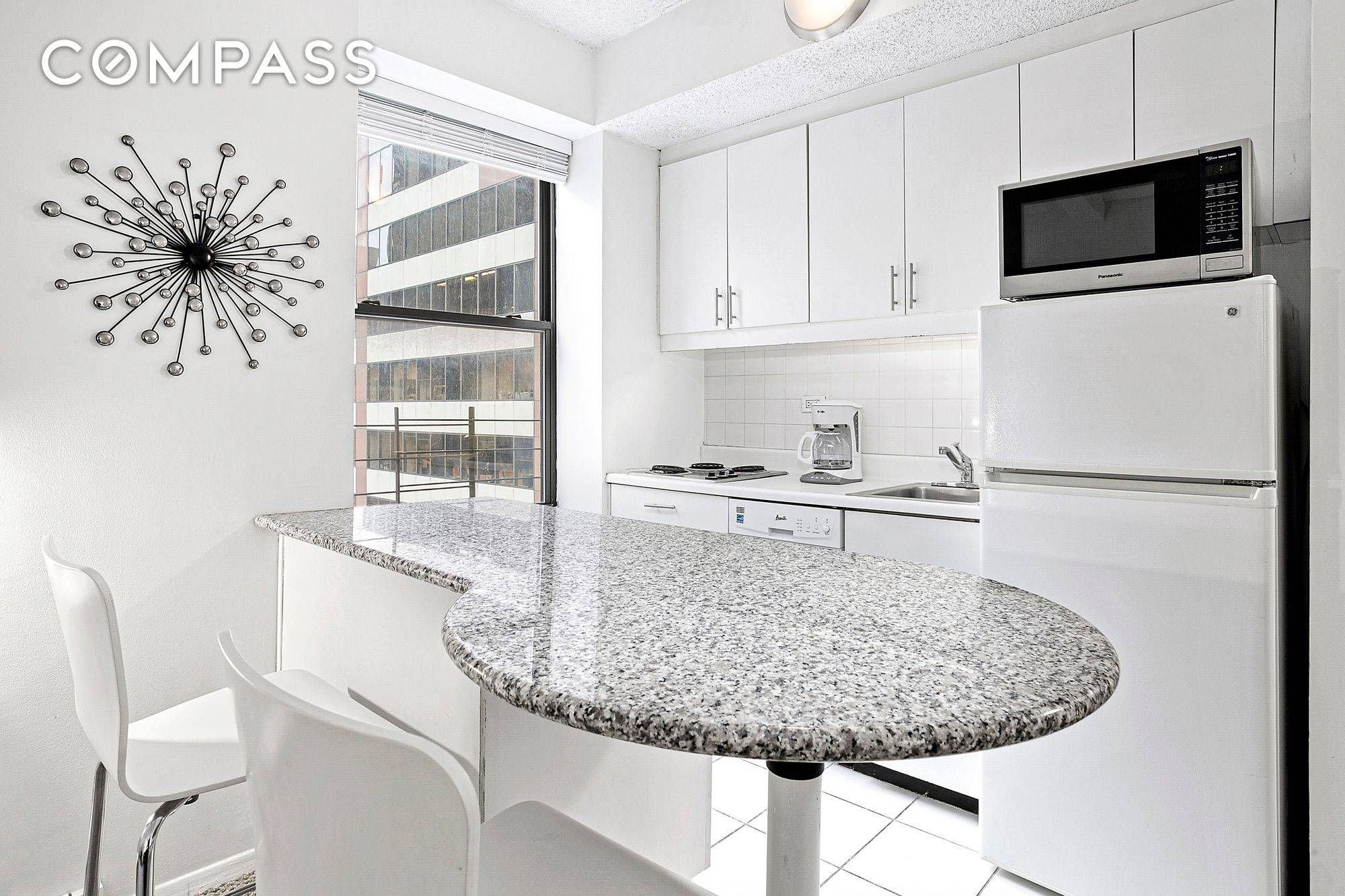 Residence 1220 is a fully furnished one bedroom at The Executive Plaza Condominium with all windows facing the exterior of the building.