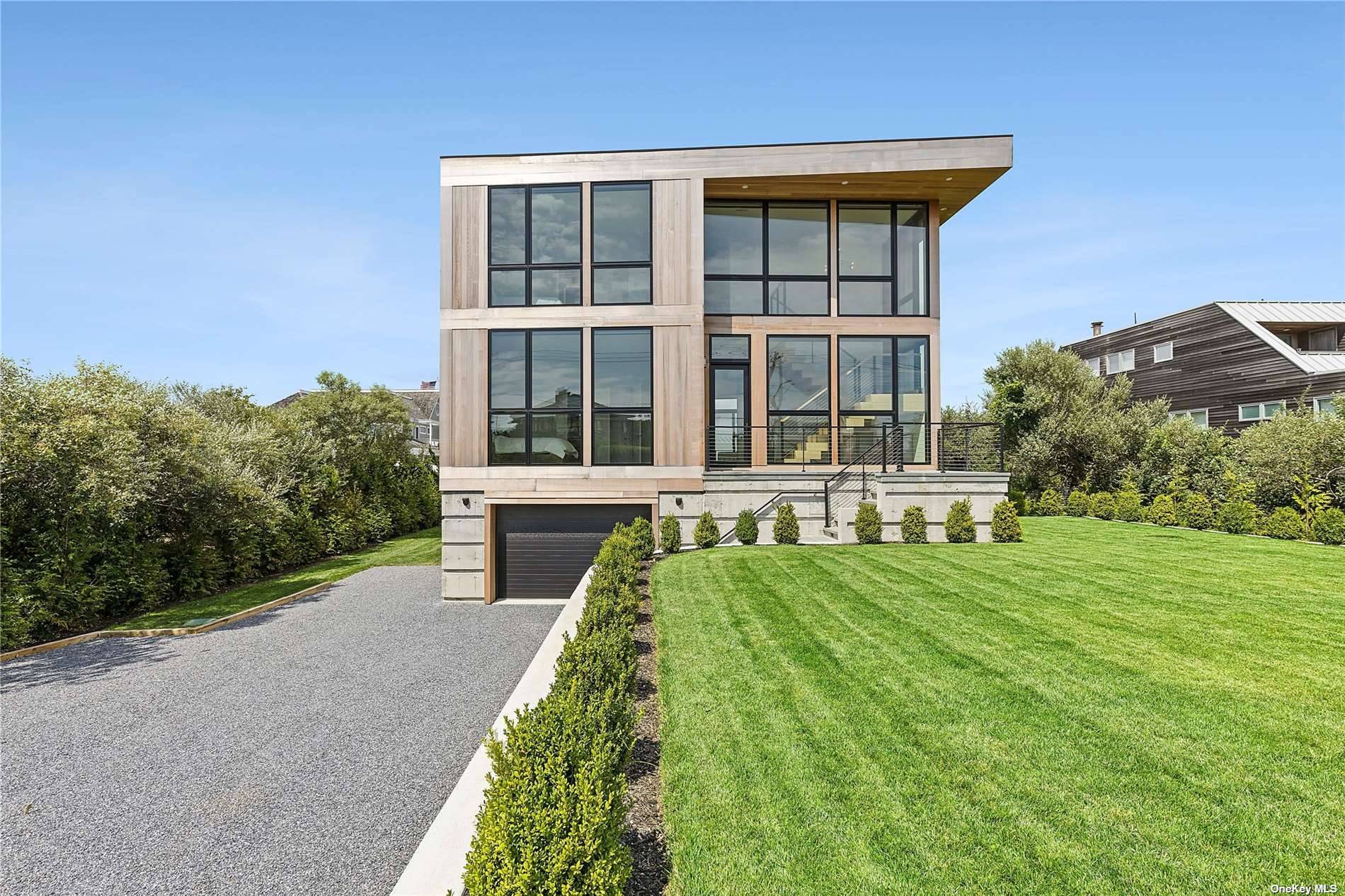 Enjoy Breathtaking Sunsets and Unobstructed Views of Moriches Bay from this Brand New, Custom Designed, Modern Home !