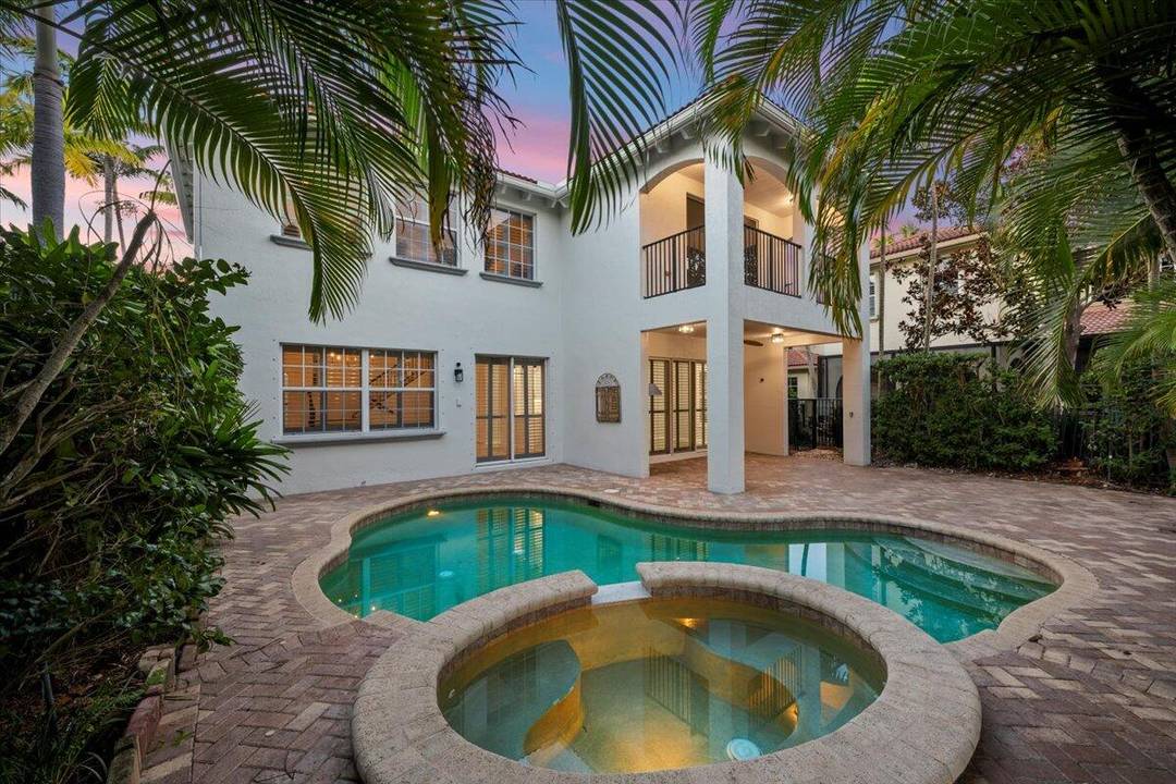 Welcome to this Stunning Lakefront Pool Home Featuring 4 Beds 3.