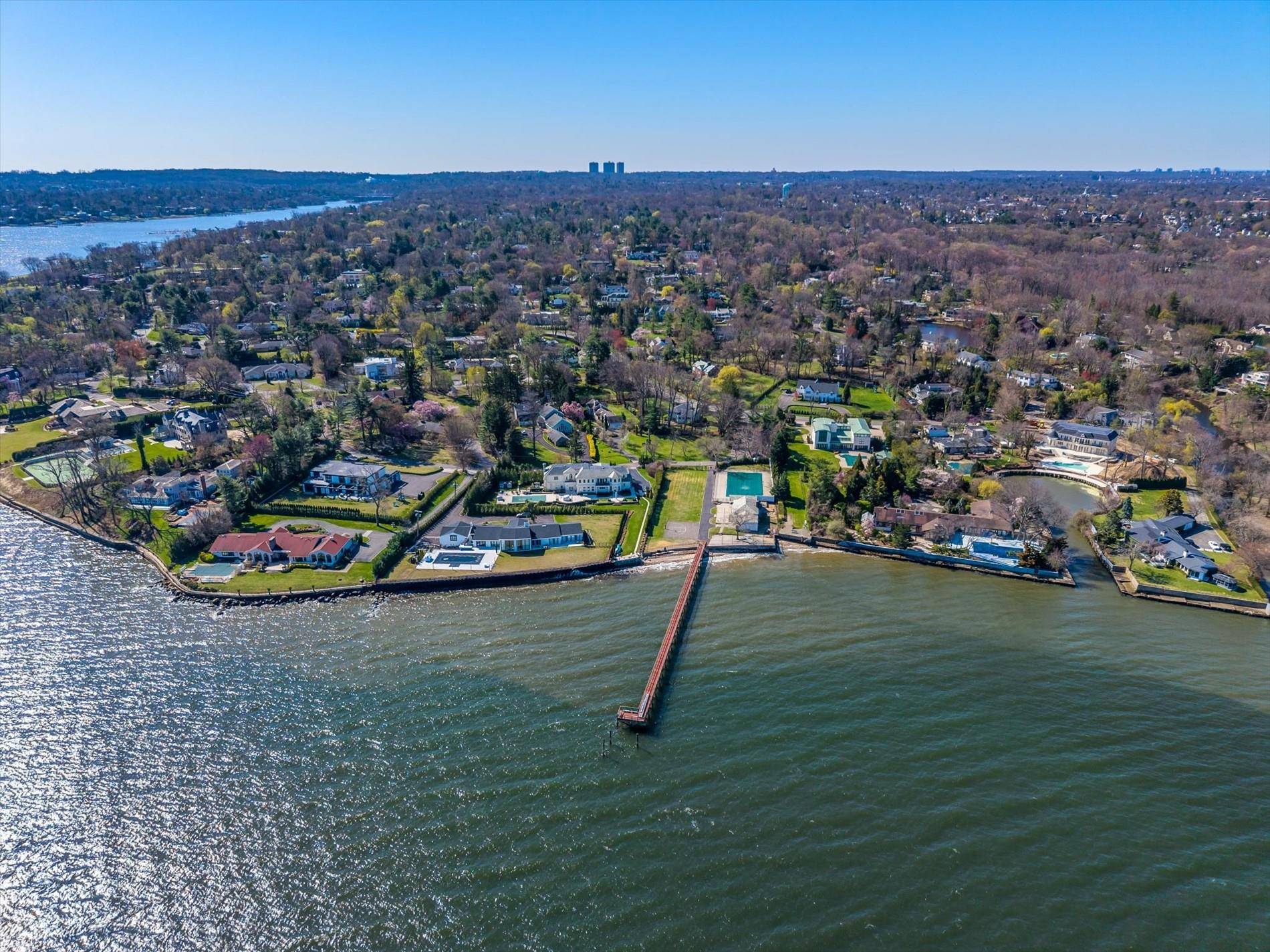 Introducing a rare and remarkable opportunity to own a piece of prime waterfront in the prestigious Village of Kings Point.