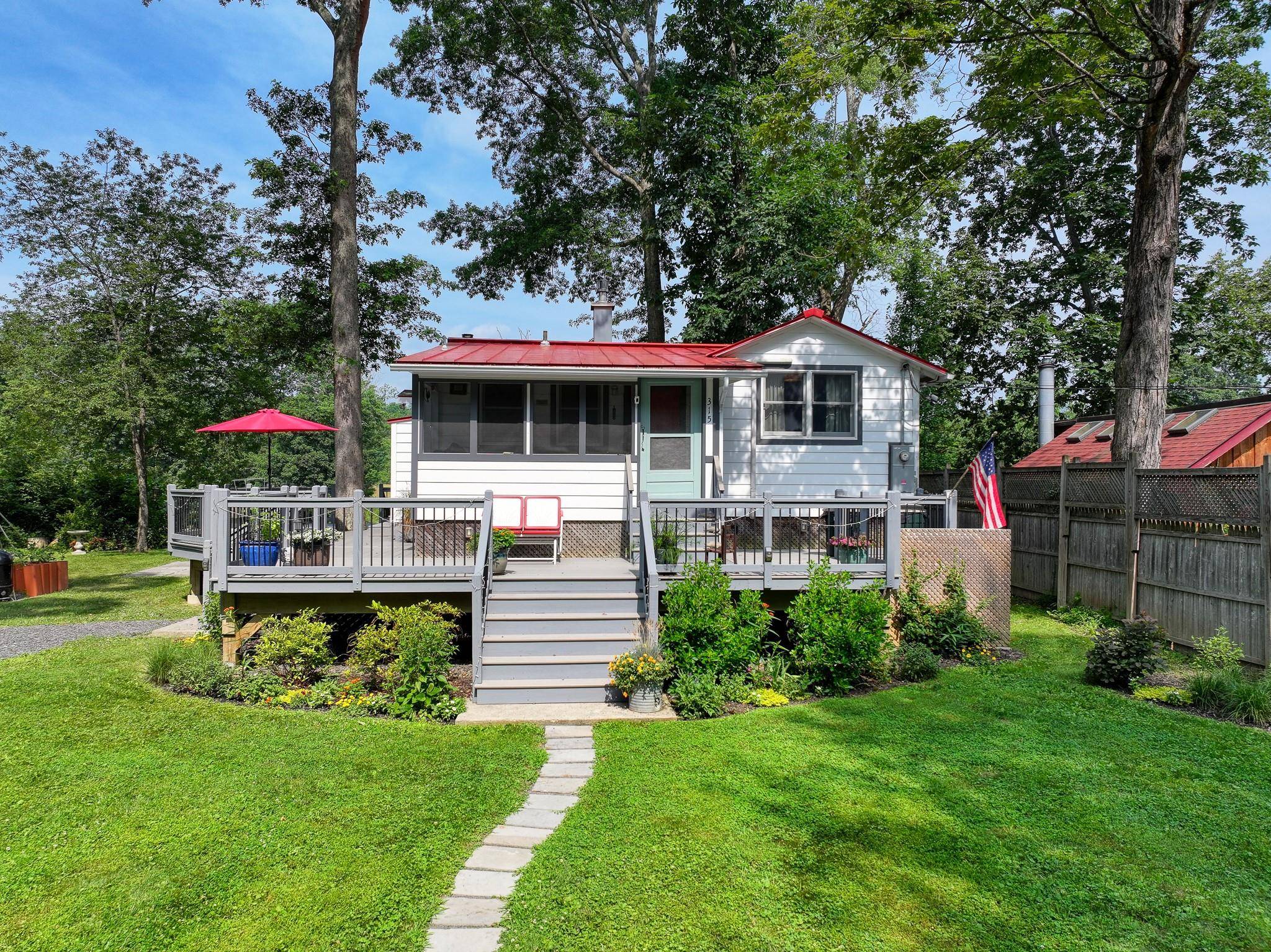 Tucked along the banks of the Wallkill River, 315 Forest Glen Extension is a rare gem.
