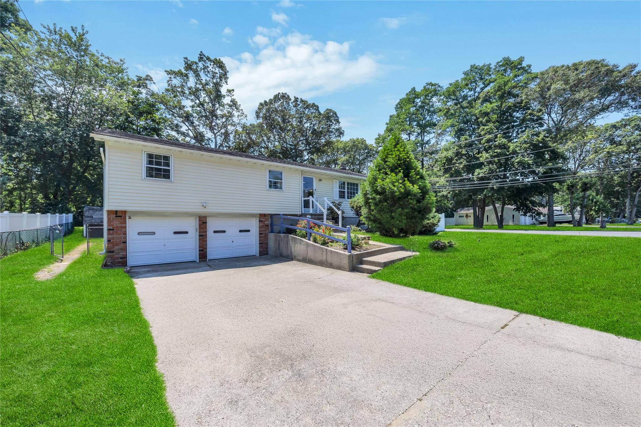 Welcome to this delightful Three Bedroom, Two Bathroom Raised Ranch that is perfectly situated on a spacious corner lot.