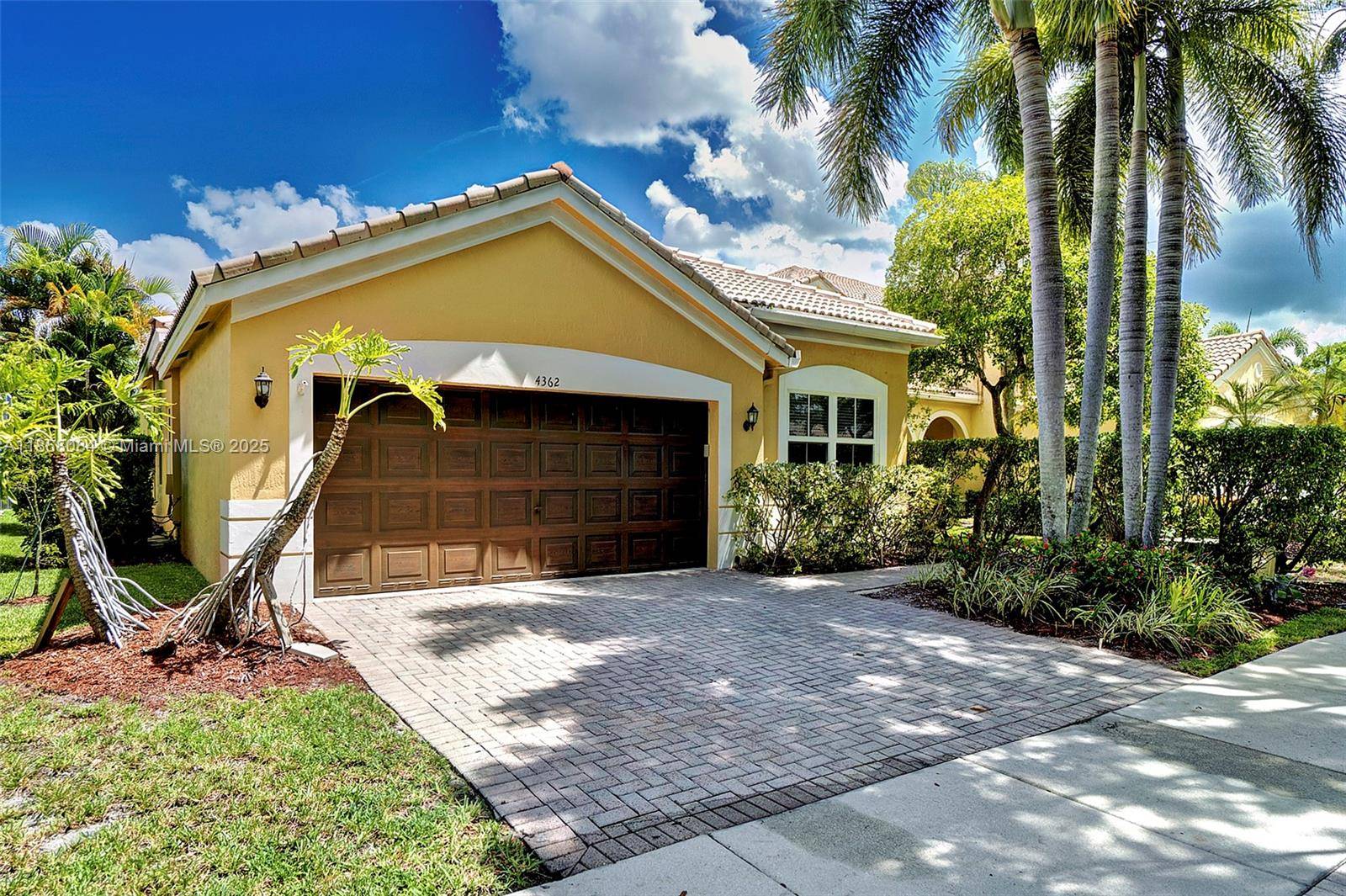 Step into comfort and elegance with this beautifully updated 3 bedroom, 2 bath single family home in the prestigious gated community of The Ridges in Weston.