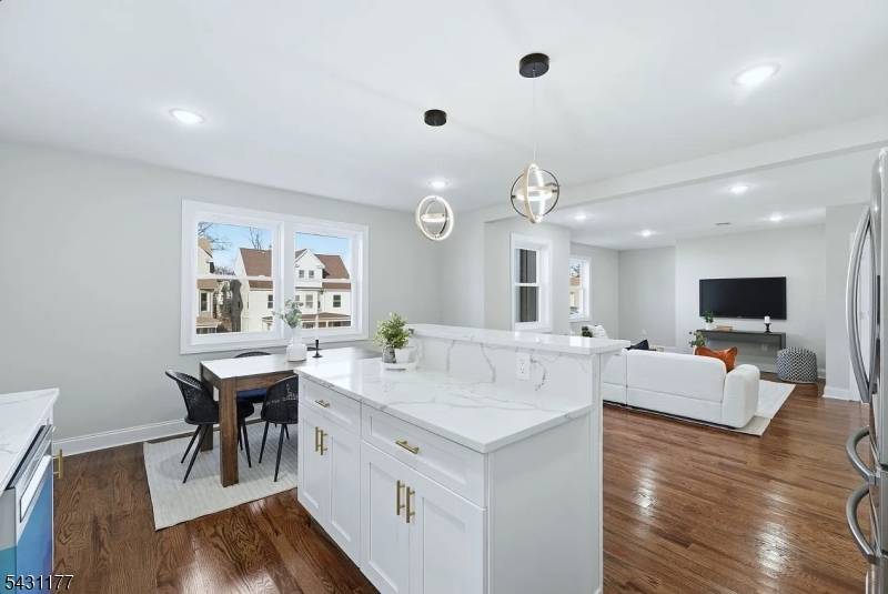 Welcome to this brand new construction side by side townhouse in East Orange, offering an exceptional blend of privacy, space, and modern design.