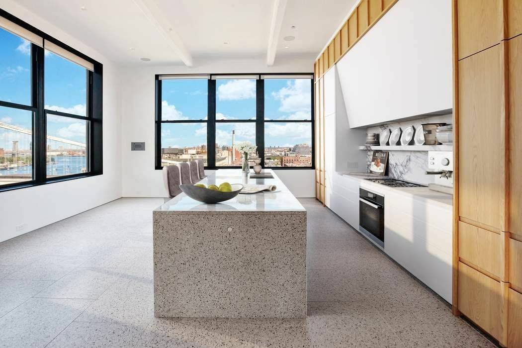 A private keyed elevator opens directly into this magnificent and approx.
