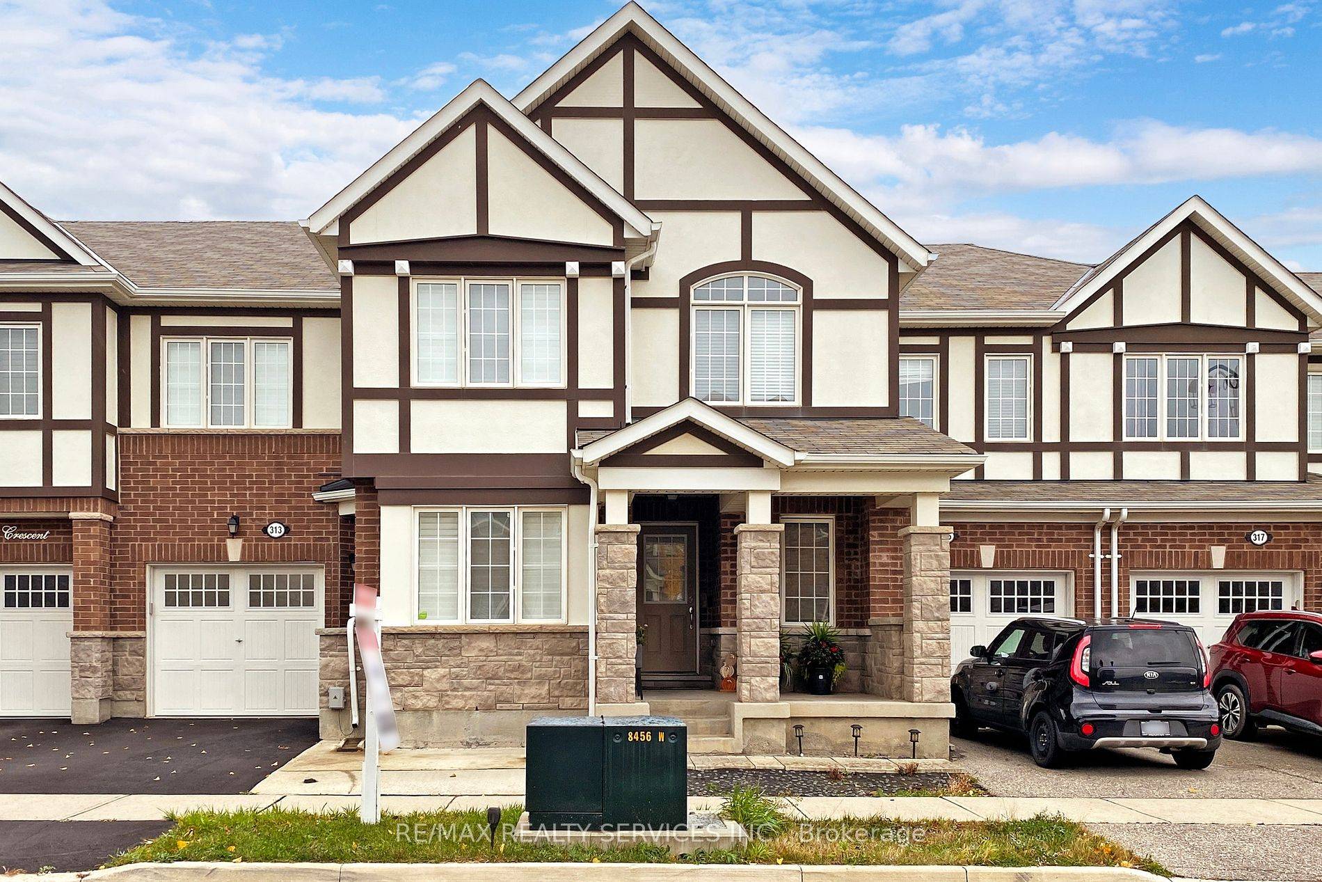 Elegant 4 bedroom, 4 bath 100 freehold townhouse featuring a modern open concept design.