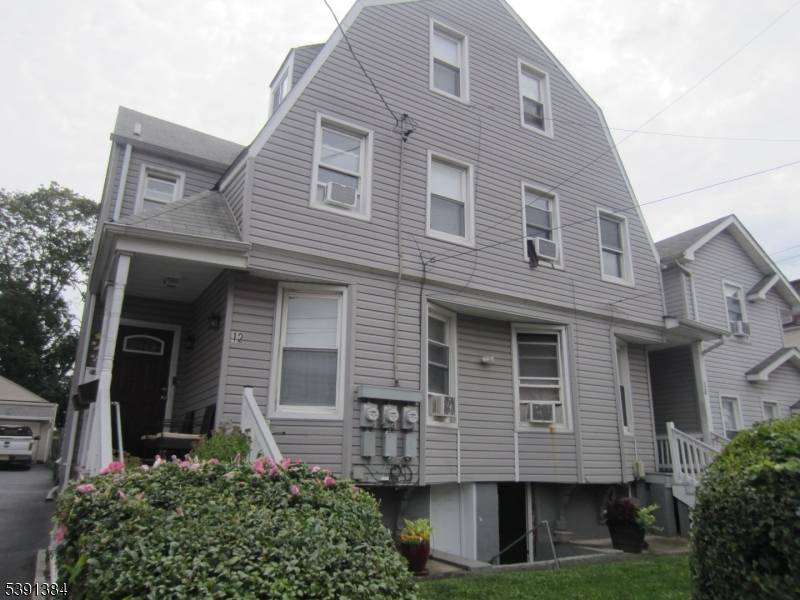 Spacious immaculate 3 story 2 family duplex, 8BRs 4 baths all updated w finished basements.