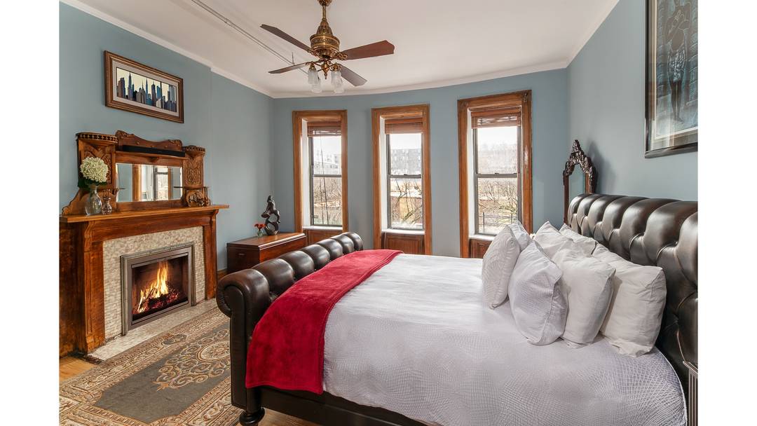 Turn of the Century townhouse in Harlem offers absolute elegance and comfort, especially when it's situated on the sunny side of the street.