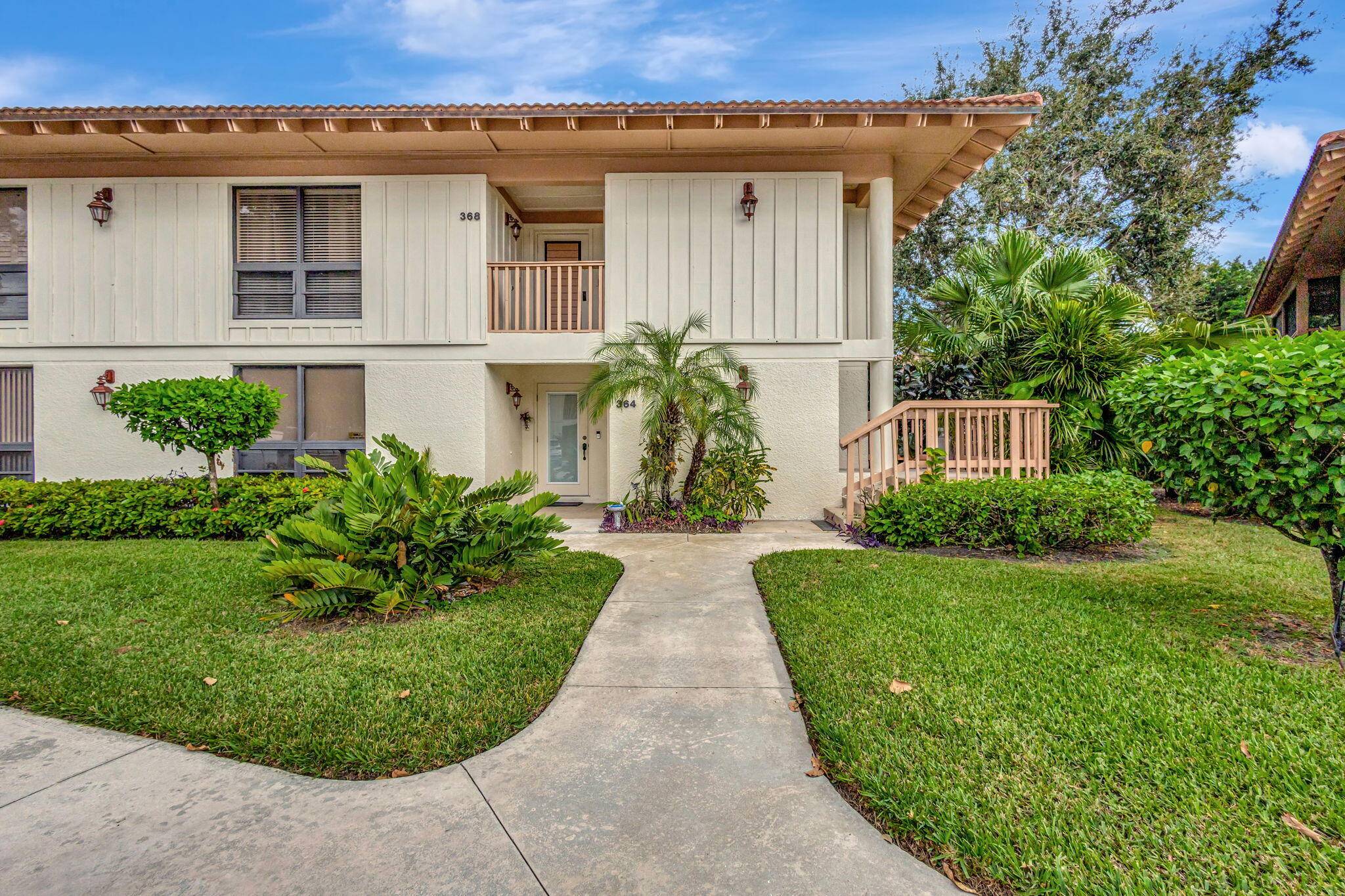 What a find ! Updated large and breezy corner unit with wraparound patio, extra windows, with a long meandering water view.