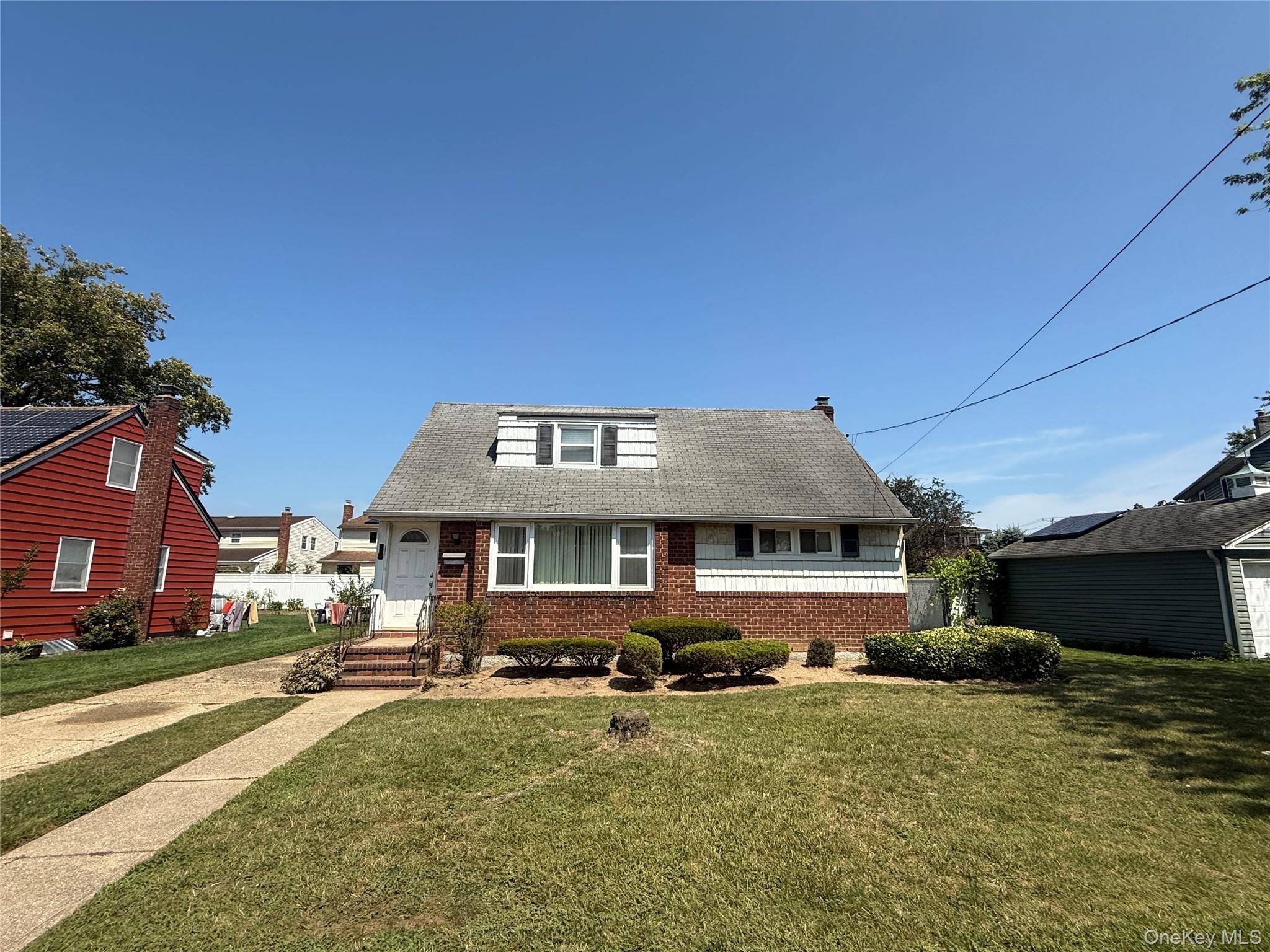 Welcome to East Meadow ! This Can Be Your Dream Home With Adding Your Own Touch and Updates.