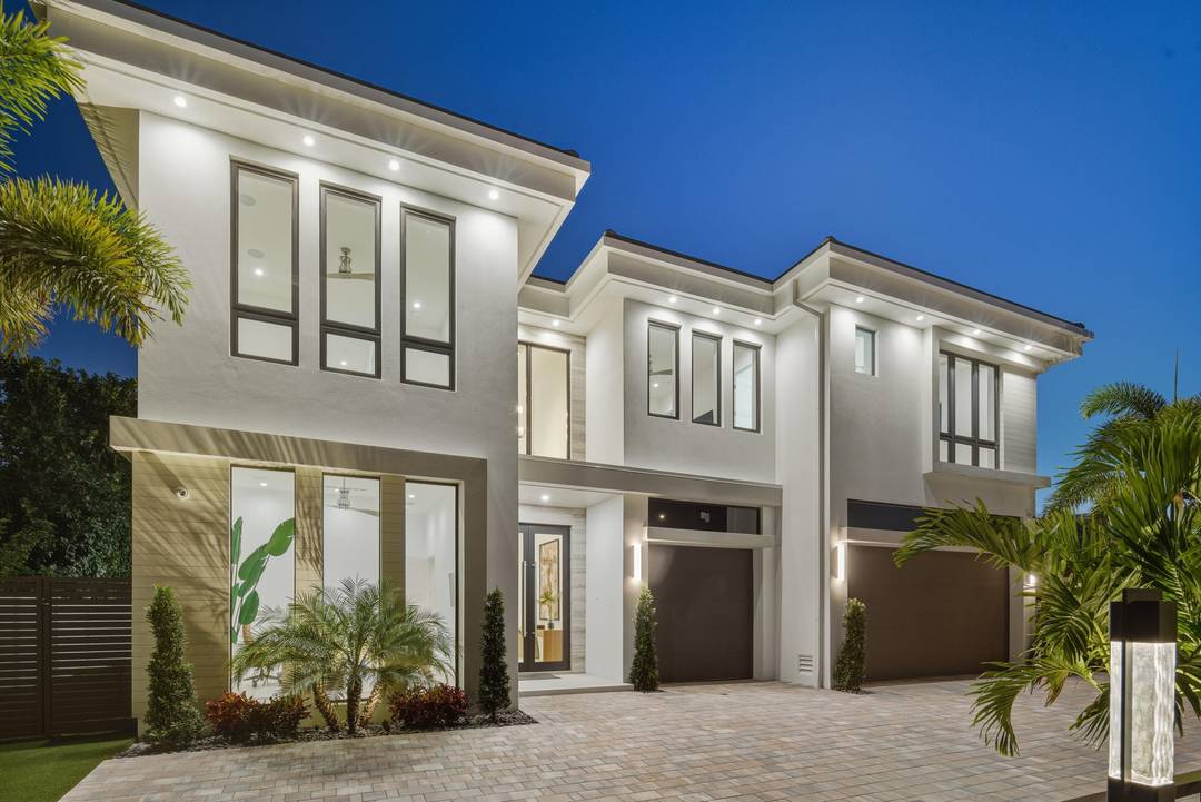 From the moment you step inside, it's clear this is no ordinary Mizner Park residence.