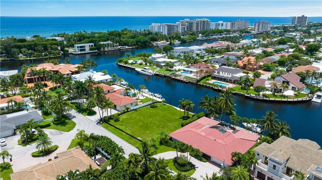 Enjoy stunning intracoastal and yacht club views from this private, southern exposure lot on the North Grand Canal.