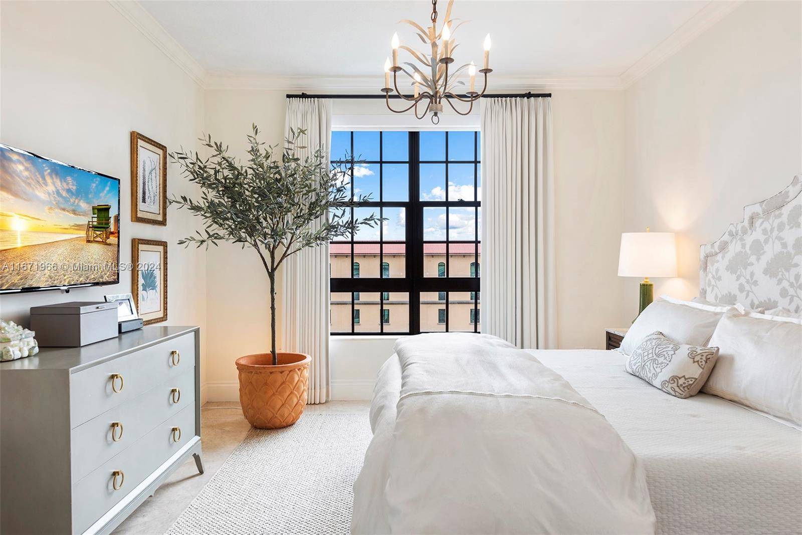 Large amp ; light filled South facing unit with elegant foyer entry and open views.