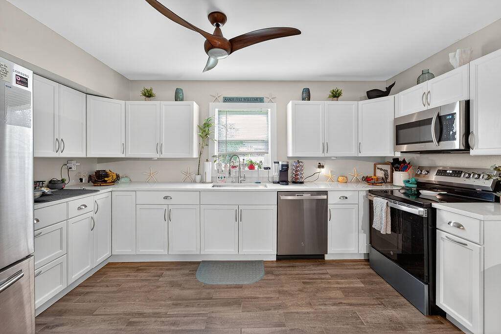 Completely renovated CBS ranch style home with 4 bedrooms and 2 baths on 1 3 fenced acre.